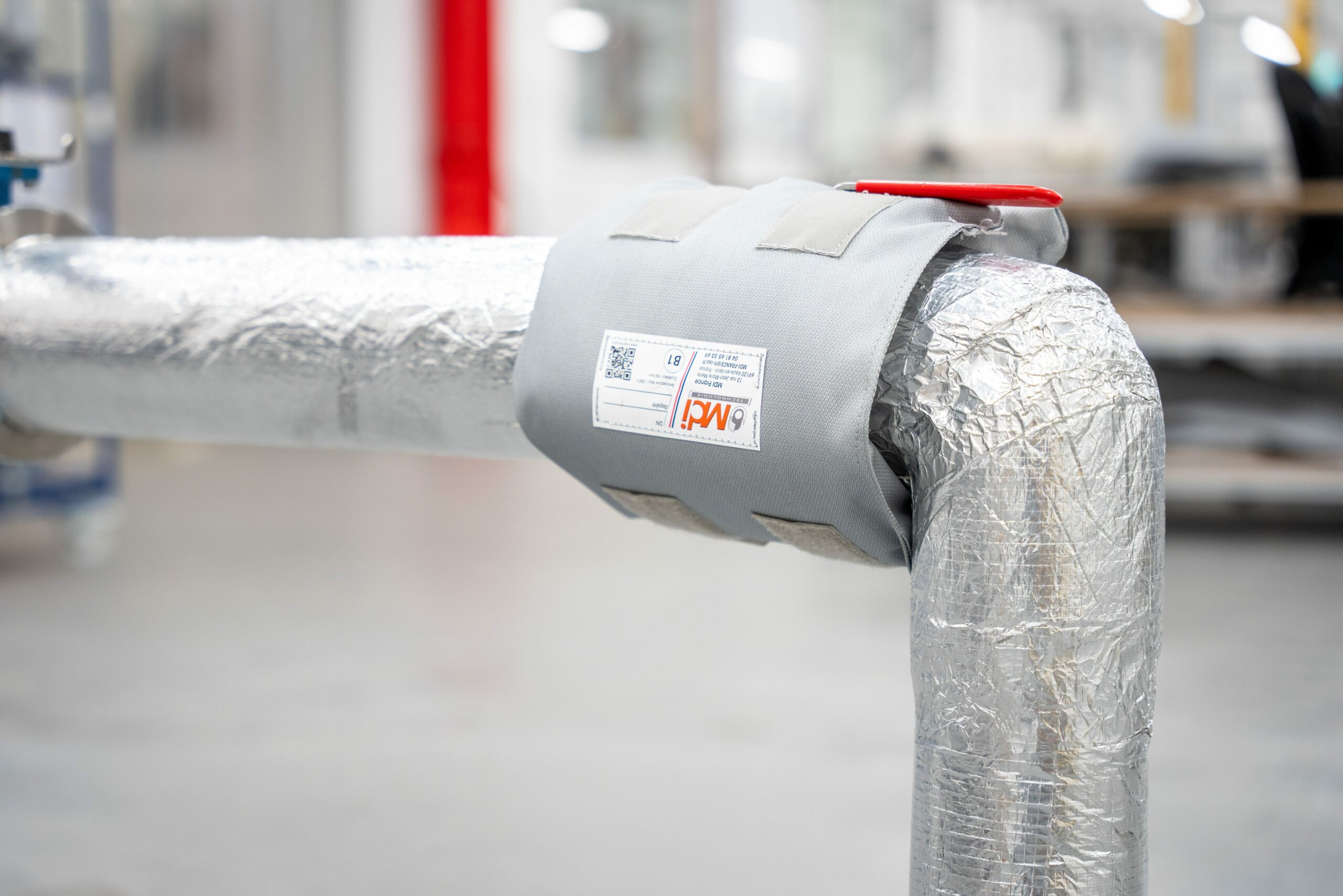 Isolation de points singuliers par matelas thermique pour vannes industrielles